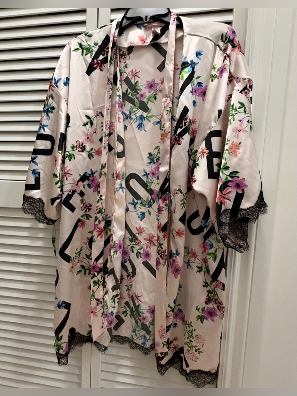 Victoria’s Secret Pink floral satin robe with black lettering and lace trim